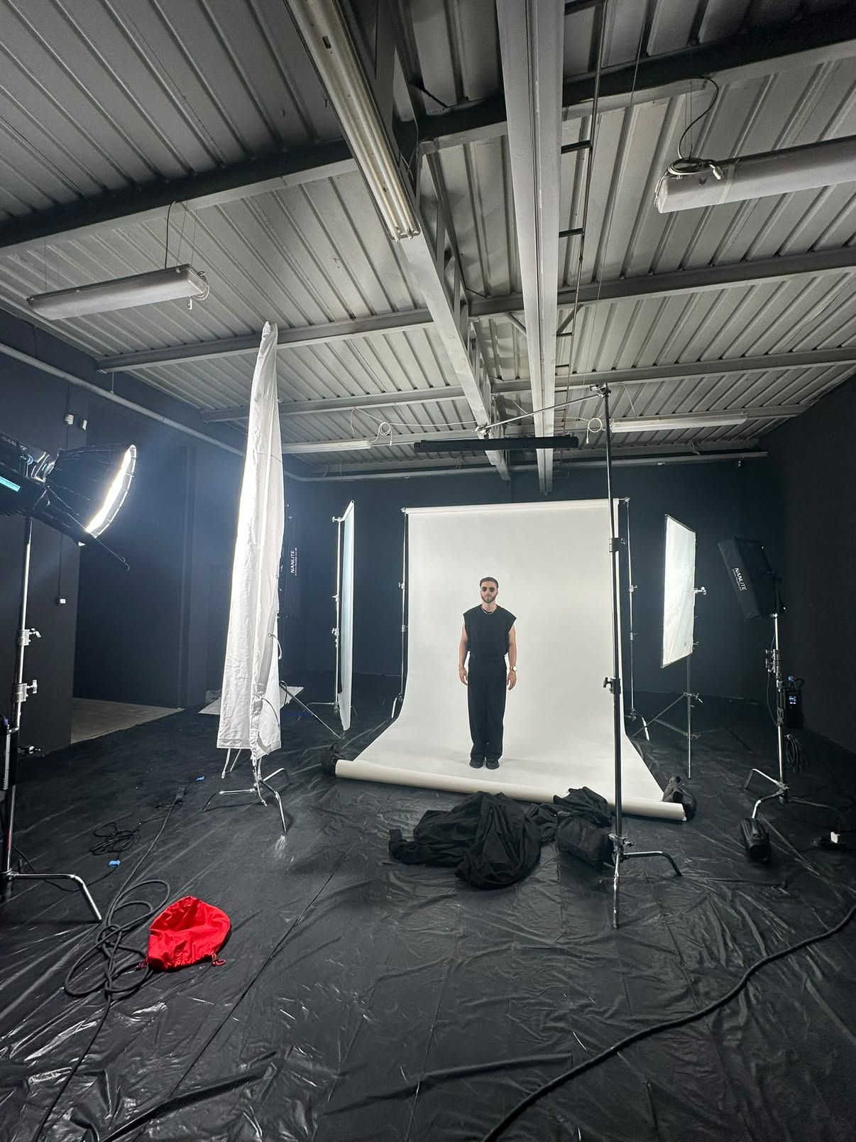 Photo studio set with background paper and softboxes